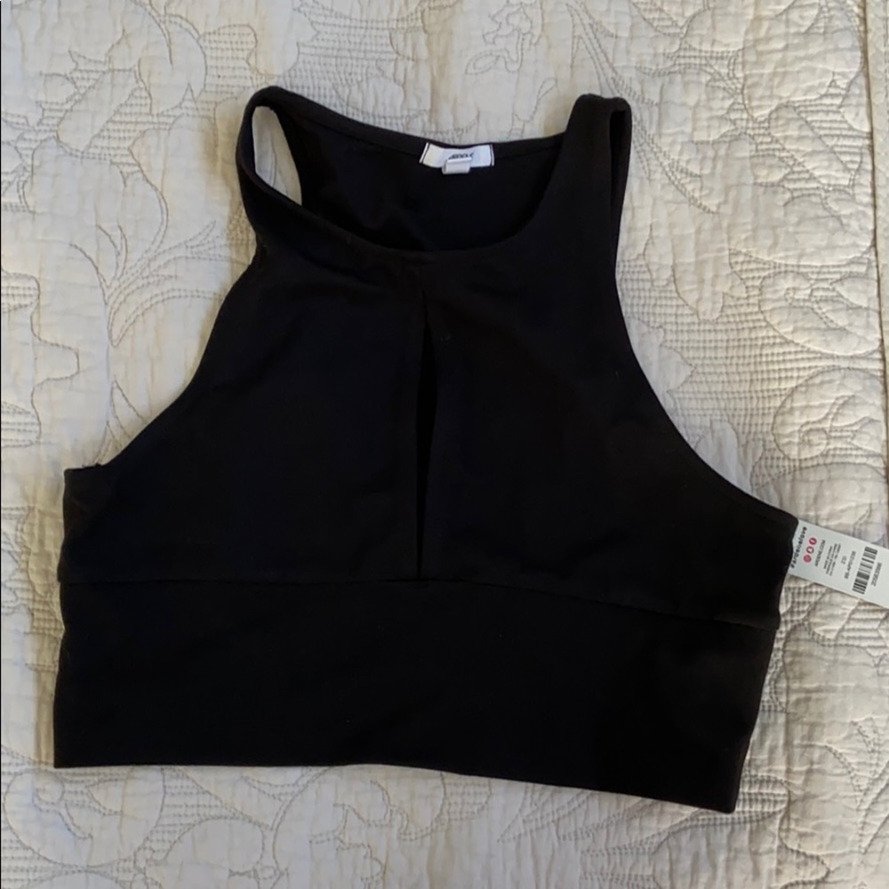 Black tight creep top with slit in middle